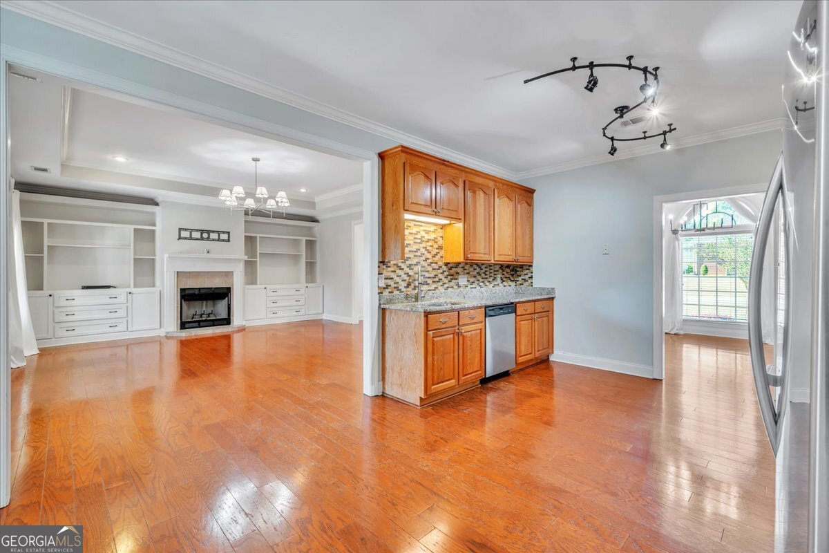 100 Fox Den Court Dublin, GA 31021 - Photo 5 of 26 a view of an empty room with window and kitchen view