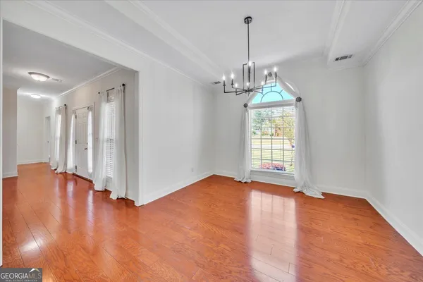 a view of livingroom with hardwood floor and window