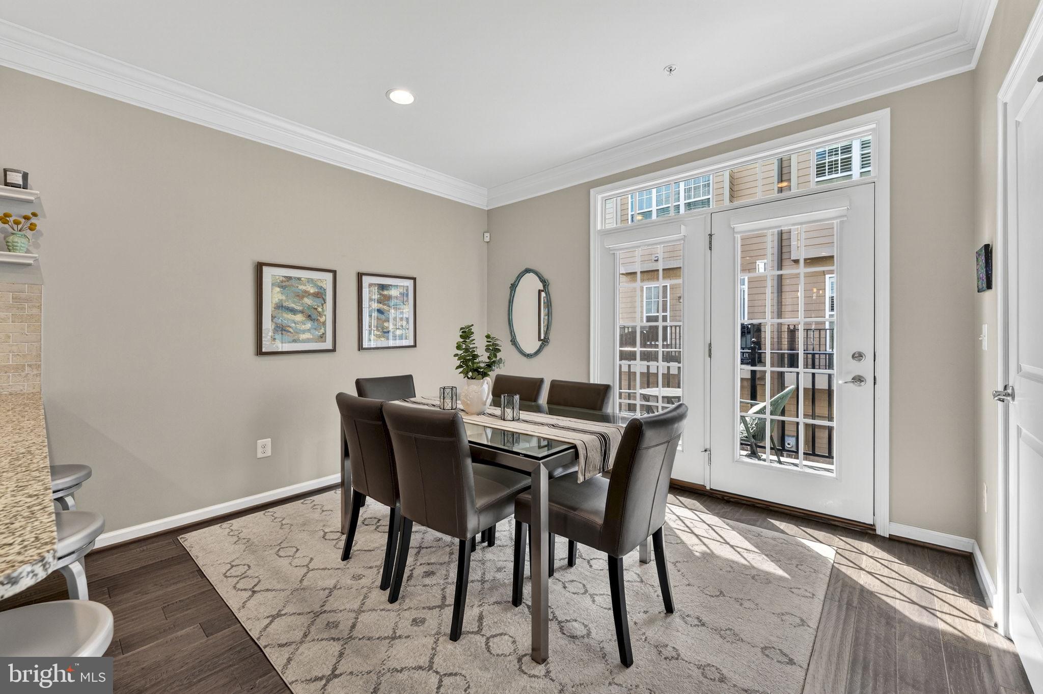 459 Haupt Square Southeast Leesburg, VA 20175 - Photo 18 of 80 a view of a dining room with furniture window and wooden floor