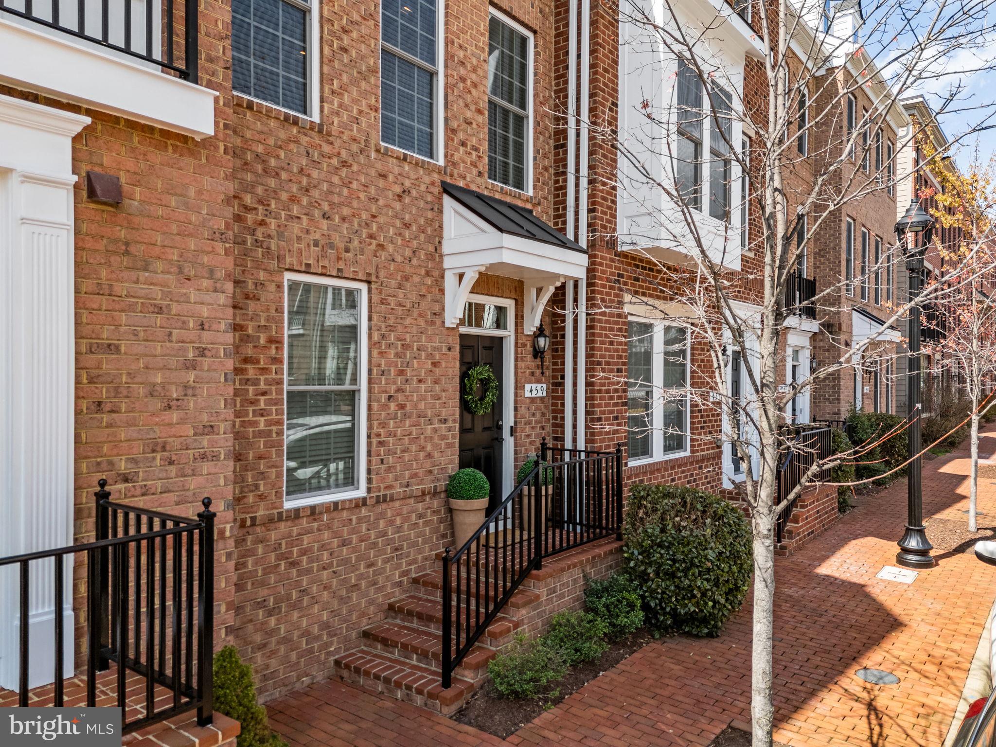459 Haupt Square Southeast Leesburg, VA 20175 - Photo 2 of 80 a view of a brick building with many windows