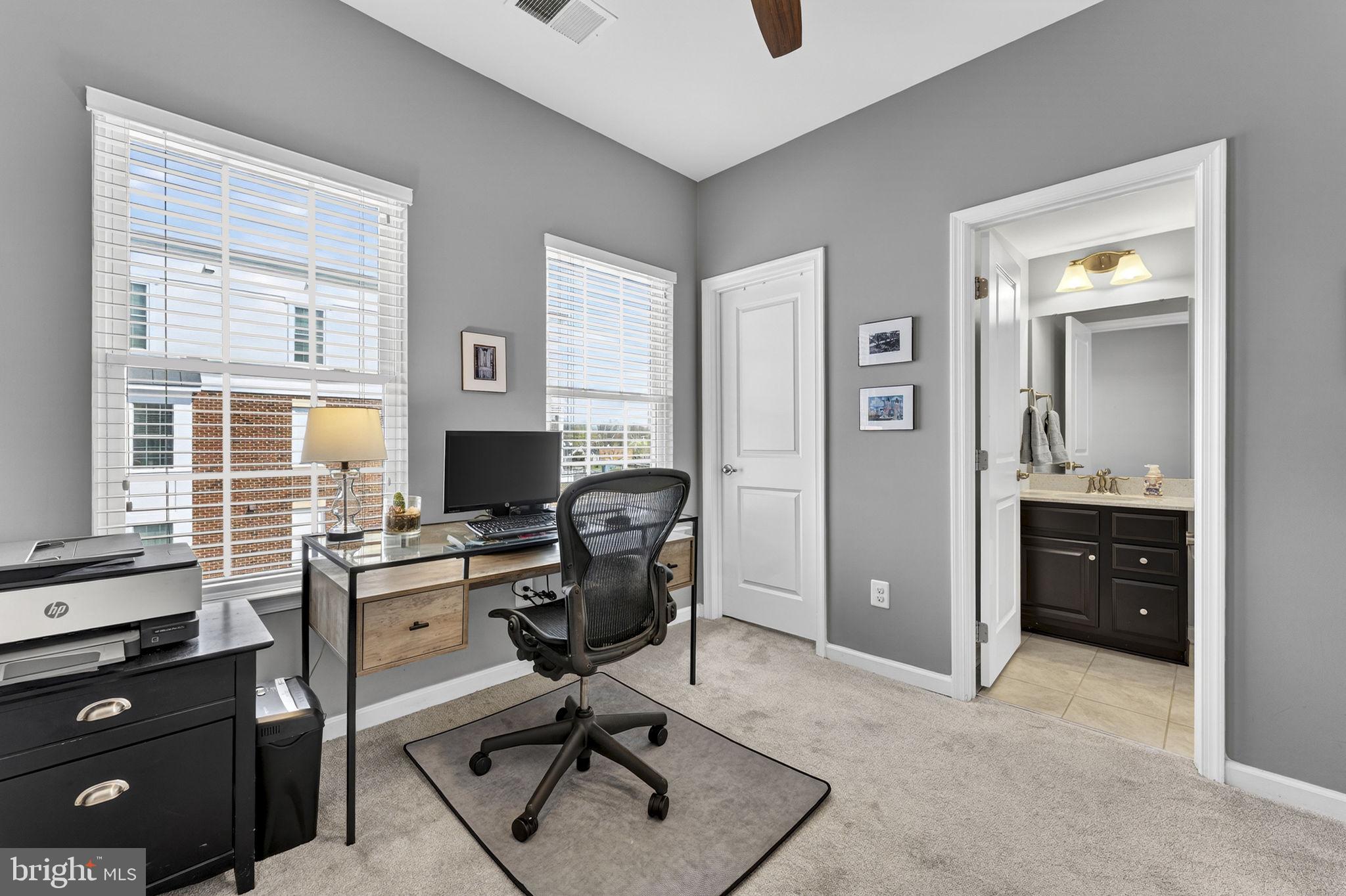 459 Haupt Square Southeast Leesburg, VA 20175 - Photo 42 of 80 a view of a workspace with furniture and a window
