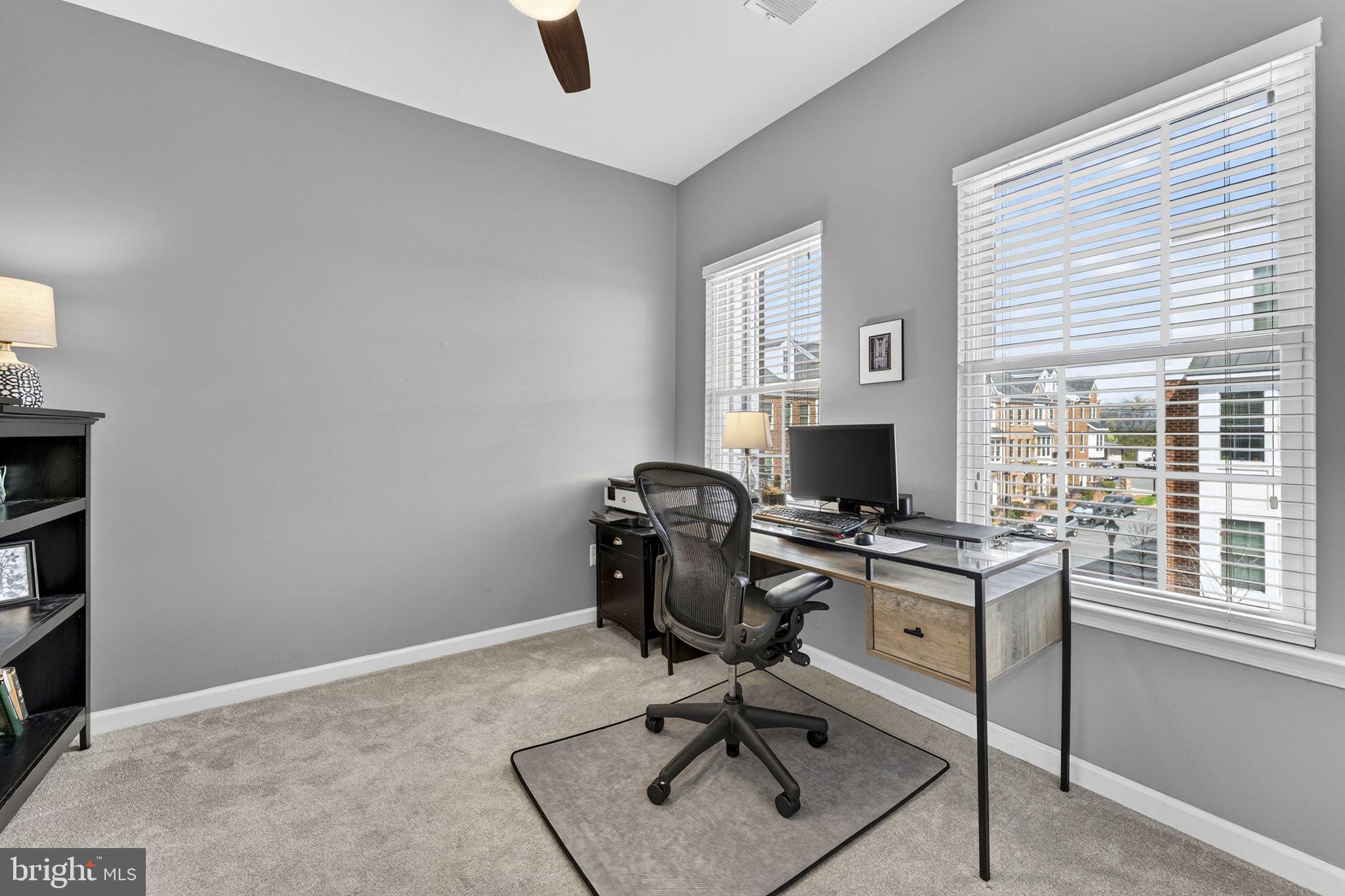 459 Haupt Square Southeast Leesburg, VA 20175 - Photo 43 of 80 a view of a workspace with furniture and a window