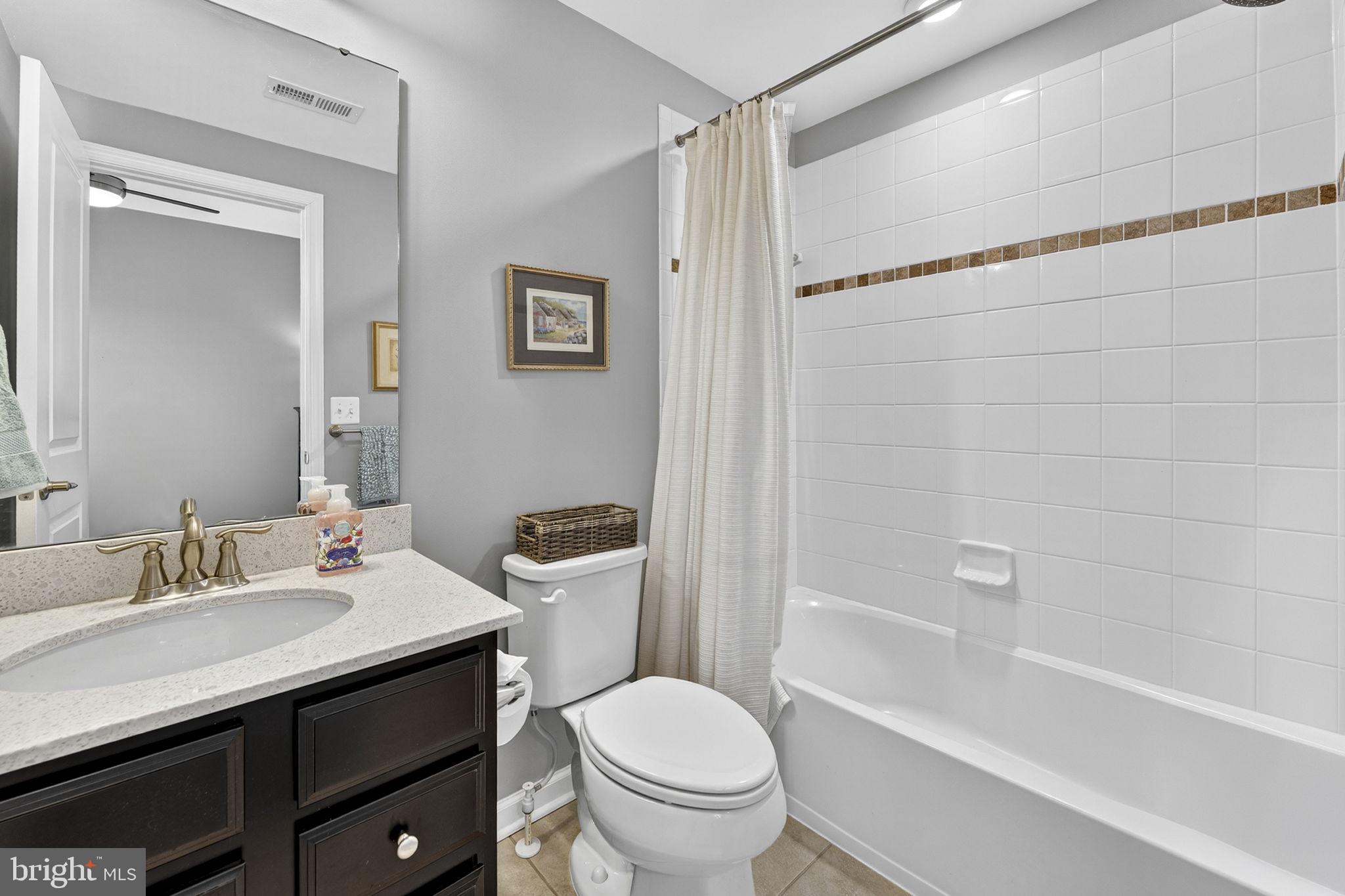 459 Haupt Square Southeast Leesburg, VA 20175 - Photo 44 of 80 a bathroom with a sink toilet and shower