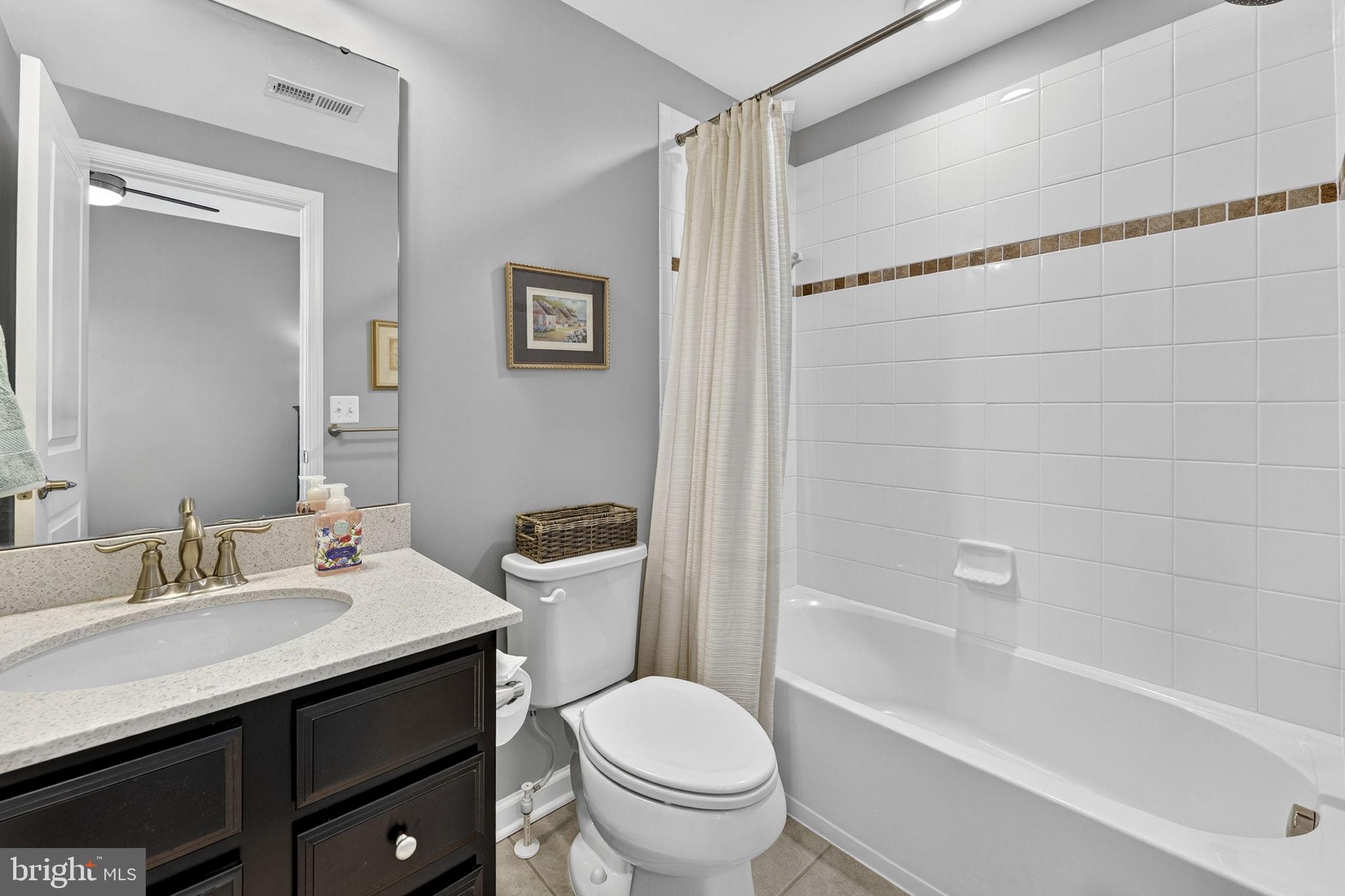 459 Haupt Square Southeast Leesburg, VA 20175 - Photo 45 of 80 a bathroom with a sink toilet and shower
