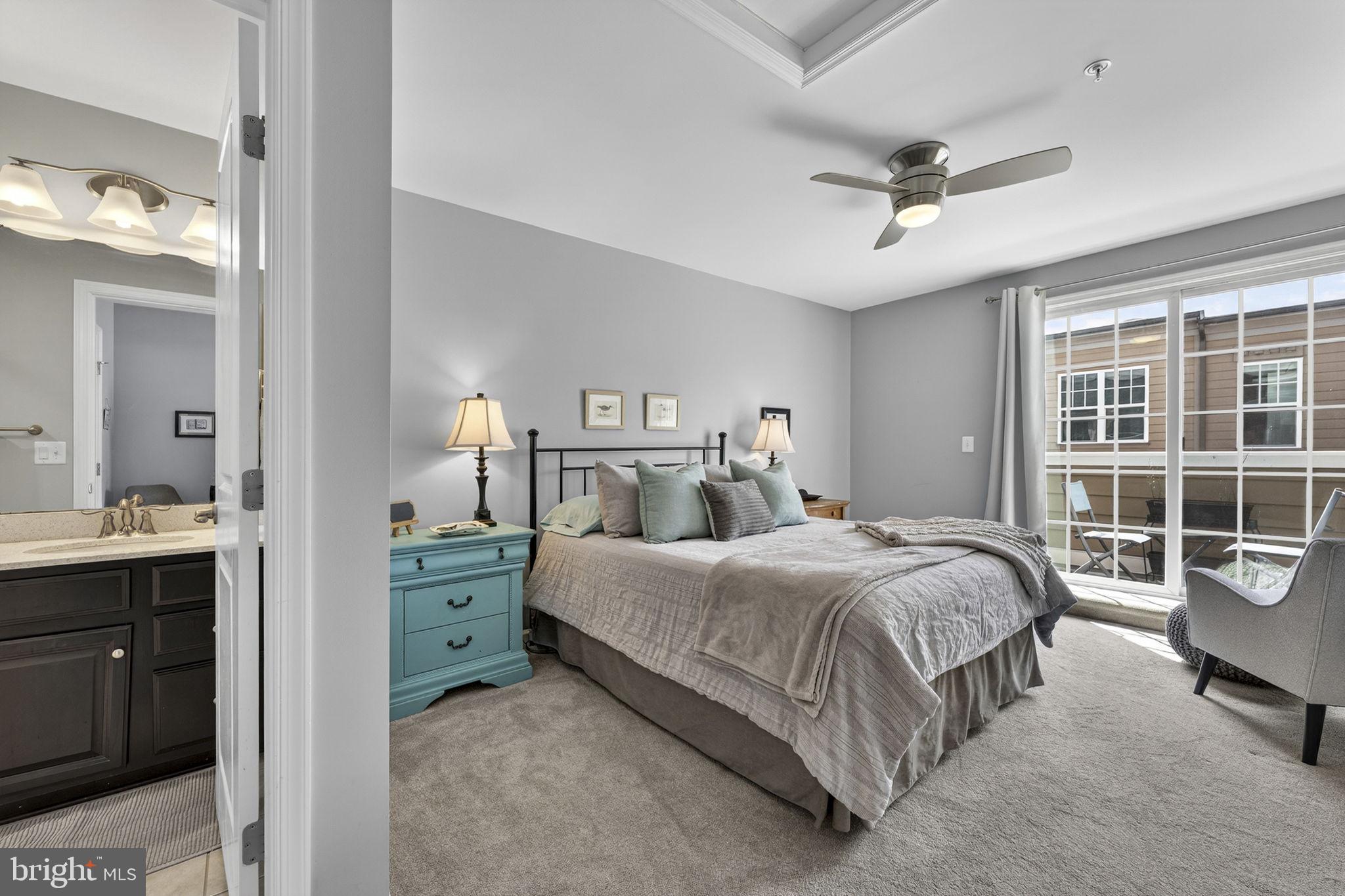 459 Haupt Square Southeast Leesburg, VA 20175 - Photo 53 of 80 a bedroom with a bed and a table in it