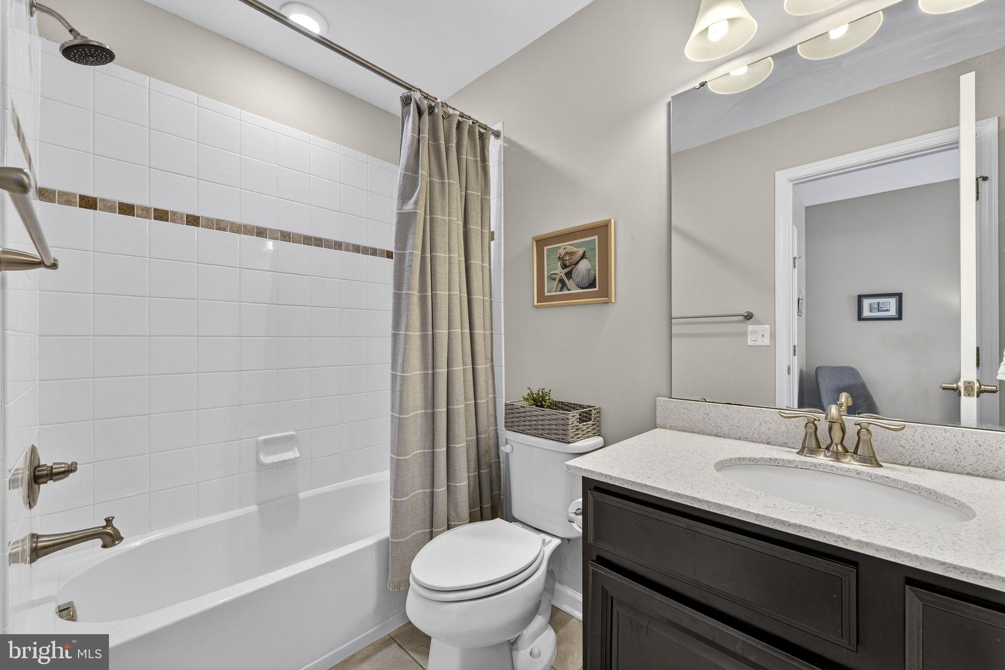 459 Haupt Square Southeast Leesburg, VA 20175 - Photo 54 of 80 a bathroom with a sink toilet and shower
