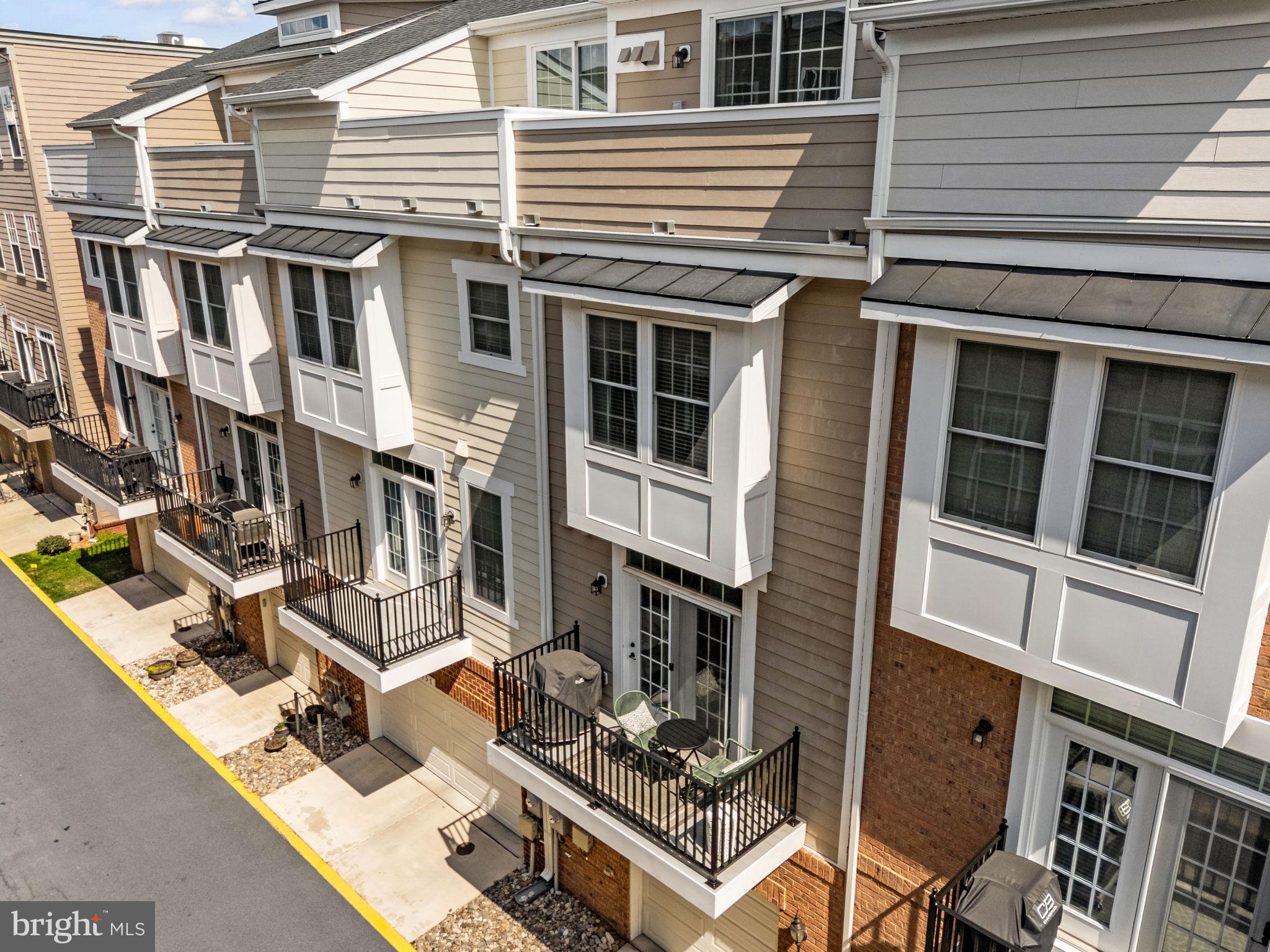 459 Haupt Square Southeast Leesburg, VA 20175 - Photo 61 of 80 a view of a house with many windows