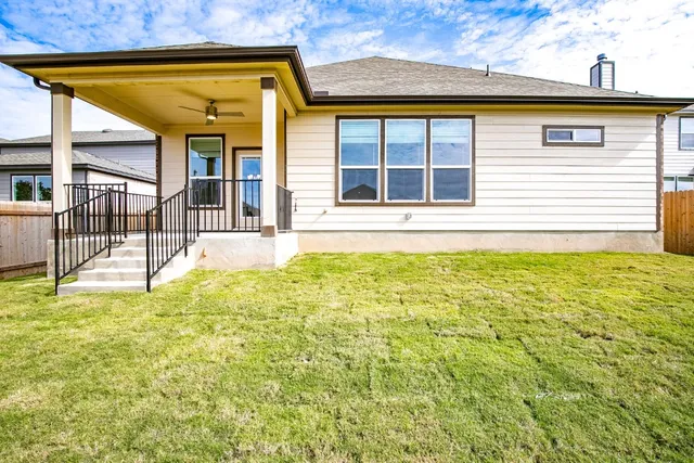 a view of a house with a swimming pool