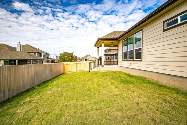 a view of a house with a swimming pool