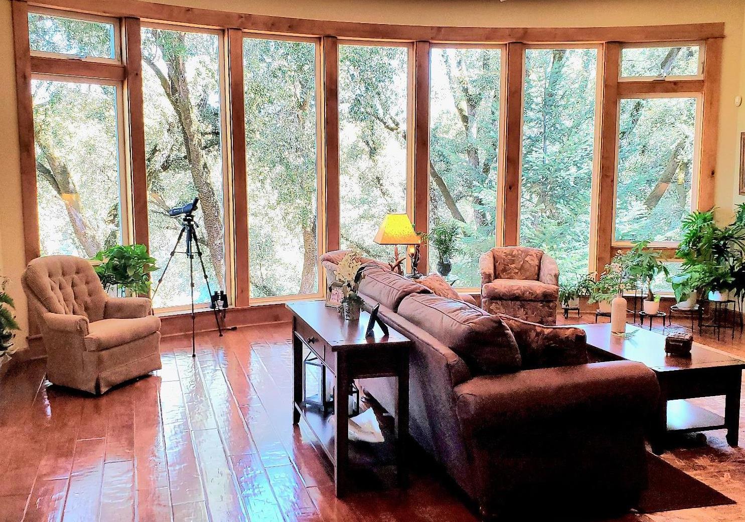 1440 Dog Bar Road Colfax, CA 95713 - Photo 11 of 93 Living Room featuring plenty of natural light, engineered hardwood flooring, and recessed lighting. Mountain views are everywhere in this custom home!