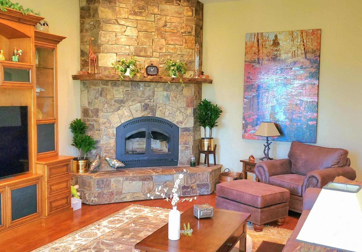 1440 Dog Bar Road Colfax, CA 95713 - Photo 13 of 93 Living Room featuring an elegant stone floor-to-ceiling fireplace, ceiling fan, engineered wood floors, and recessed lighting
