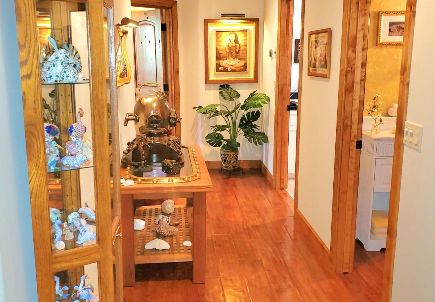 1440 Dog Bar Road Colfax, CA 95713 - Photo 24 of 93 Corridor featuring wood baseboards, trim and light engineered hardwood flooring