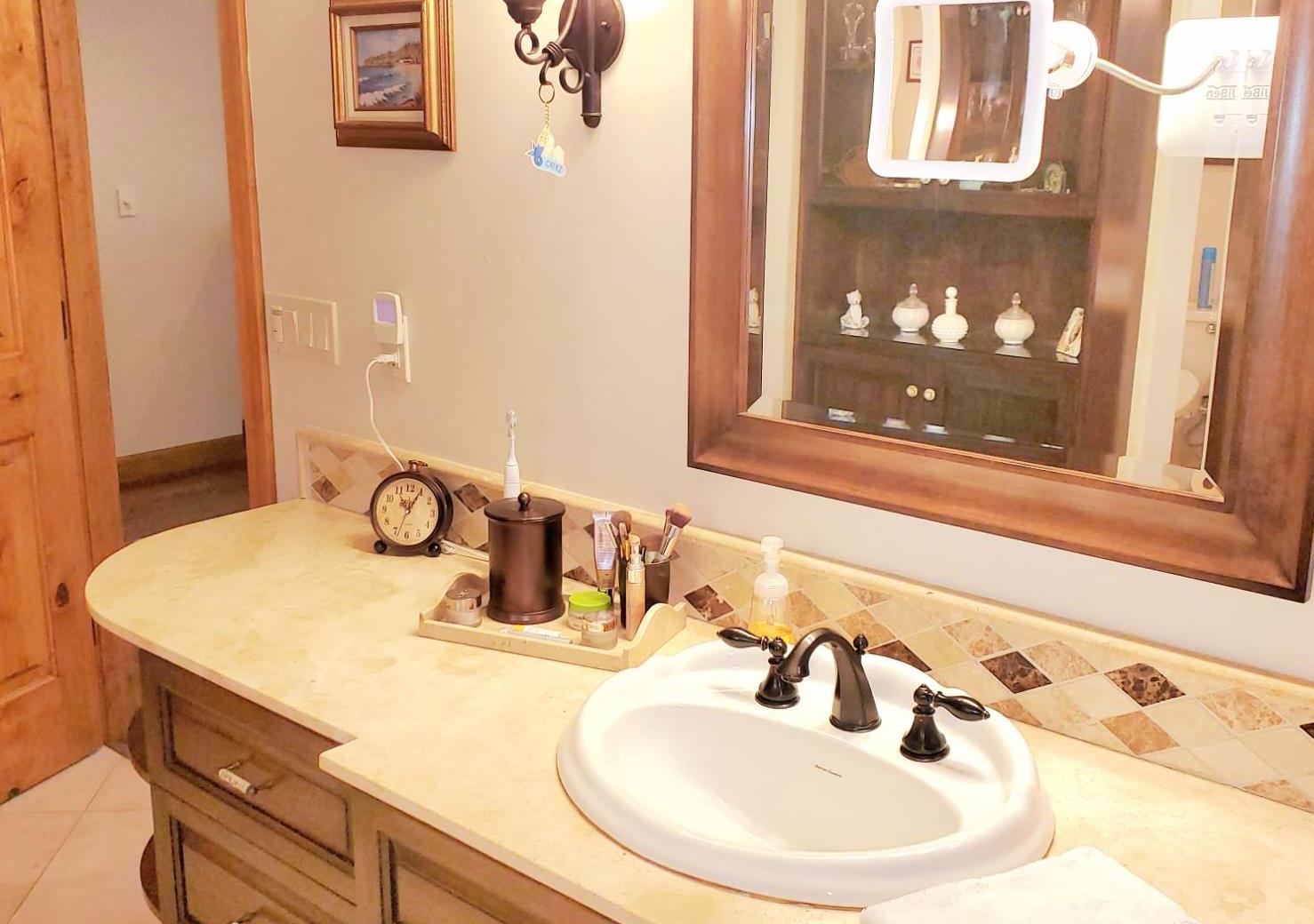 1440 Dog Bar Road Colfax, CA 95713 - Photo 32 of 93 Mater bathroom with Her Vanity, wall sconce and recessed light fixtures. Tile heated floors.