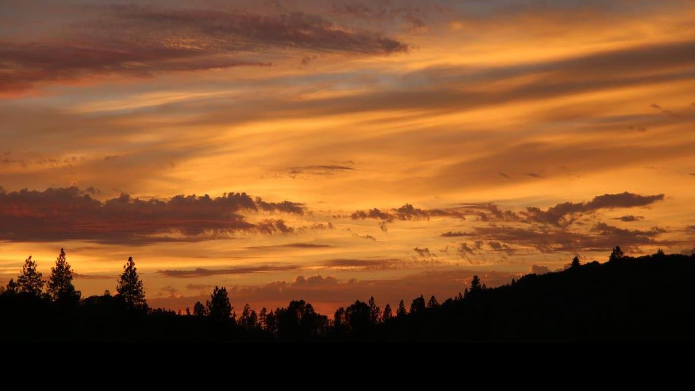 1440 Dog Bar Road Colfax, CA 95713 - Photo 38 of 93 Peaceful nightfall in the Sierra Nevada Mountains. View from the deck. After sundown the night sky comes alive with shinning stars unaffected by city lights. The night sky as it used to be!