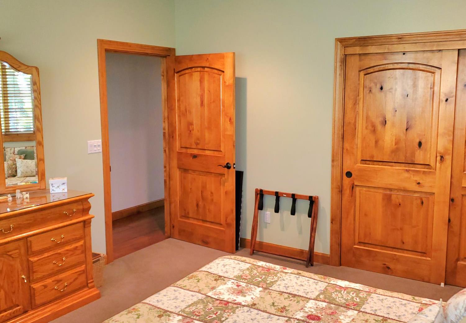 1440 Dog Bar Road Colfax, CA 95713 - Photo 56 of 93 Large bedroom 2 with recessed lighting, a ceiling fan, and solid wood doors. Full guest bathroom is conveniently located in the hallway next to this bedroom.