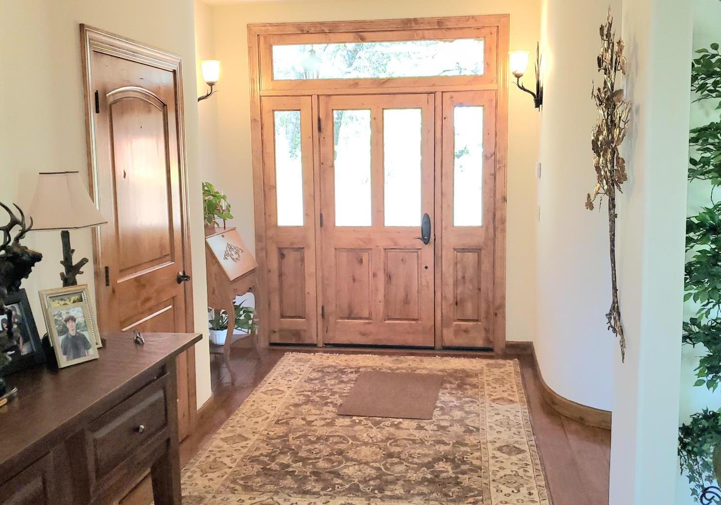 1440 Dog Bar Road Colfax, CA 95713 - Photo 6 of 93 Entrance foyer with engineered hardwood floors and a tray ceiling