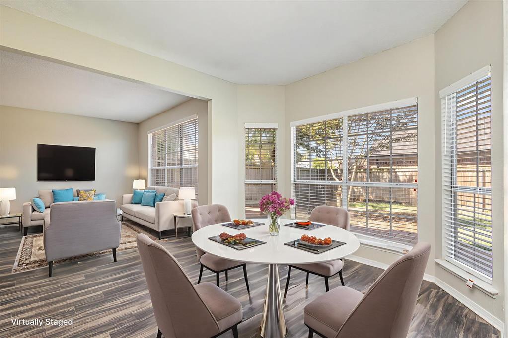 7100 Layla Road Arlington, TX 76016 - Photo 4 of 19 Virtually staged-Dining area with baseboards and wood finished floors