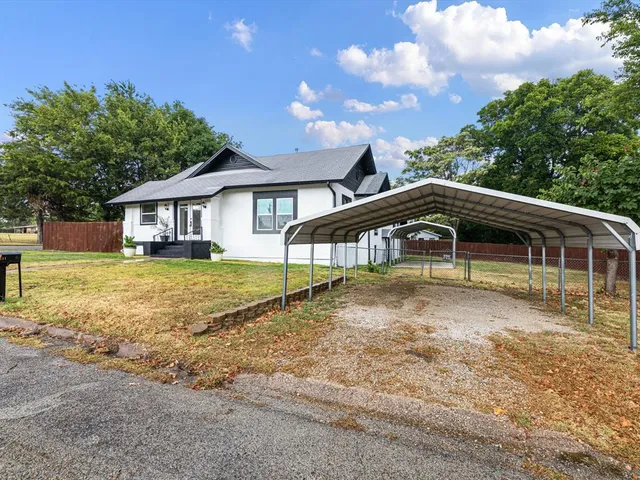 a view of porch with wooden floor and fence