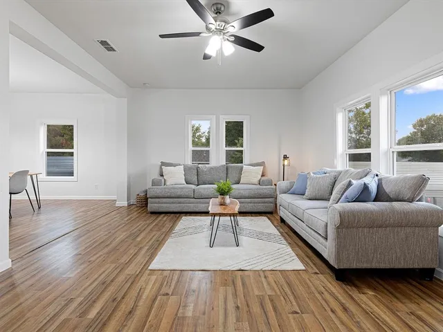 a house with swimming pool in front of it