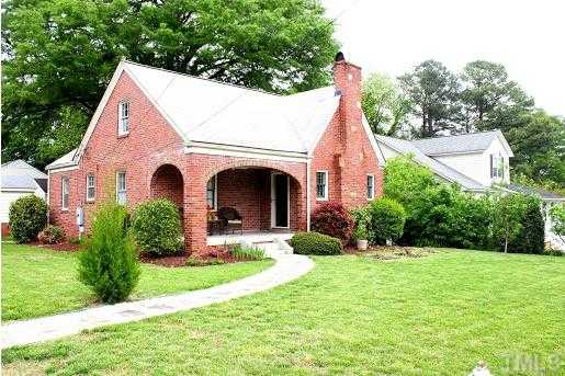 601 Harding Street Raleigh, NC 27604 - Photo 1 of 24 a view of house with garden space and trees