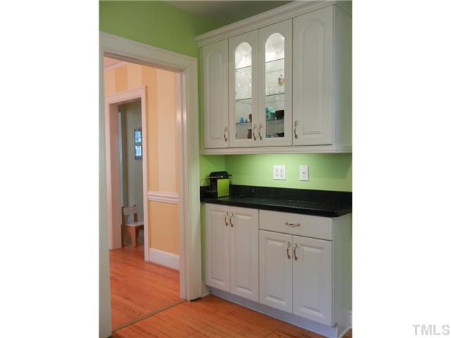 601 Harding Street Raleigh, NC 27604 - Photo 5 of 24 a bathroom with a sink and a mirror