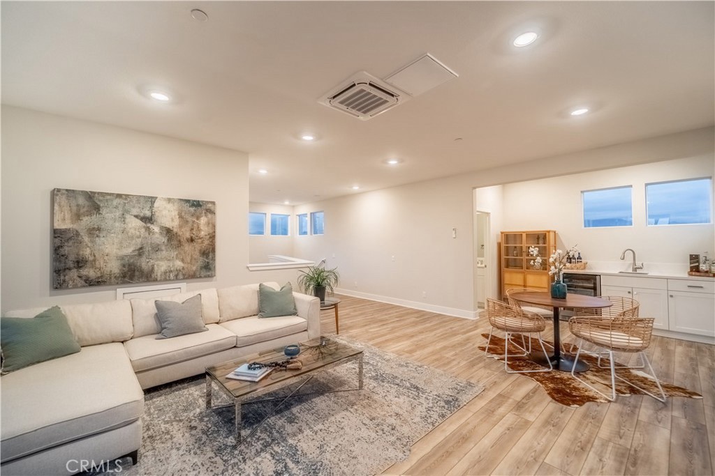 599 Serrano Summit Drive Lake Forest, CA 92630 - Photo 14 of 19 a living room with furniture and a table