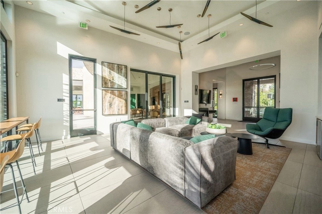 599 Serrano Summit Drive Lake Forest, CA 92630 - Photo 17 of 19 a living room with furniture and a large window