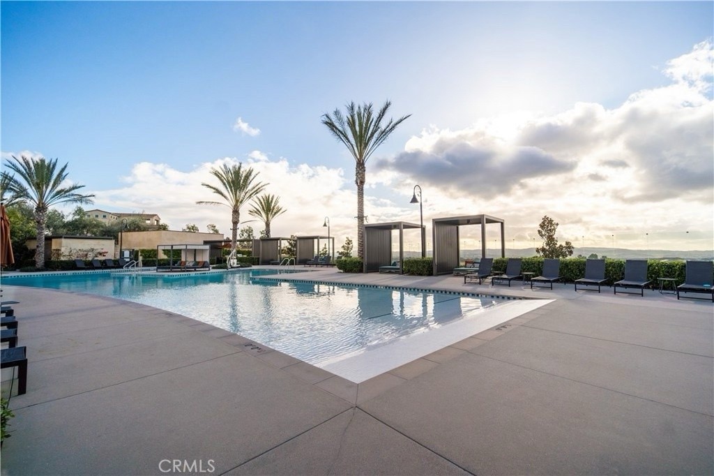 599 Serrano Summit Drive Lake Forest, CA 92630 - Photo 19 of 19 a view of a swimming pool with outdoor seating
