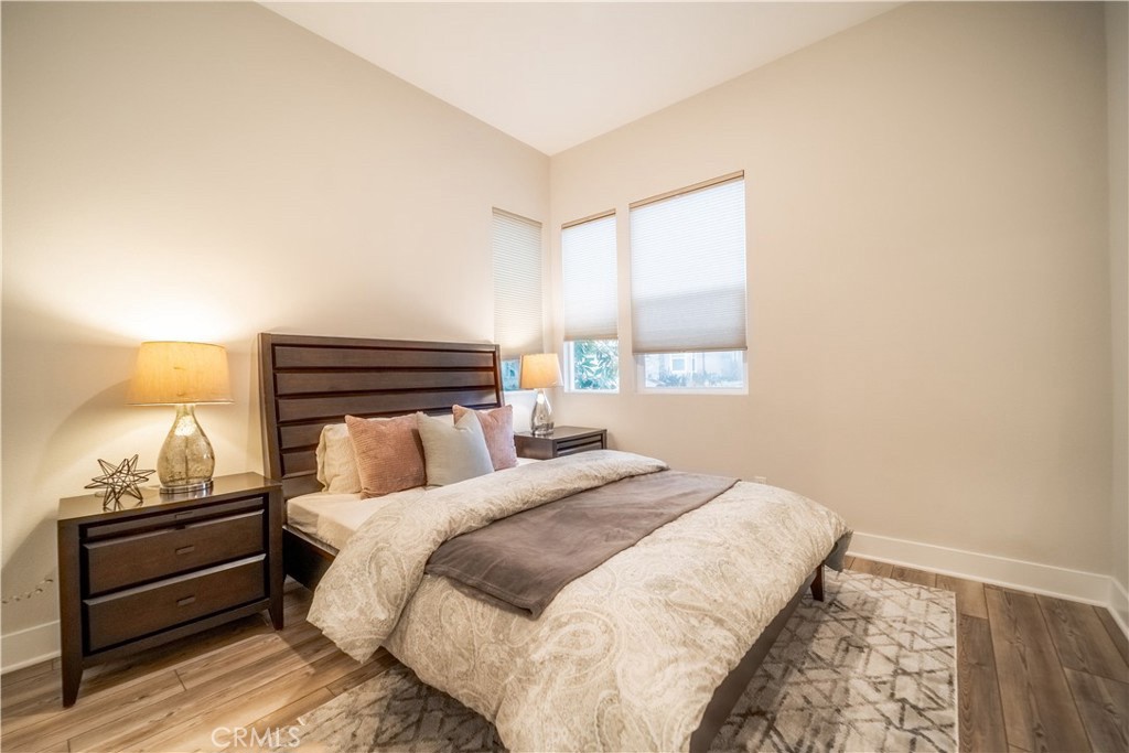 599 Serrano Summit Drive Lake Forest, CA 92630 - Photo 7 of 19 a bedroom with a bed and a window