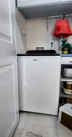 a view of a chairs and table on the terrace