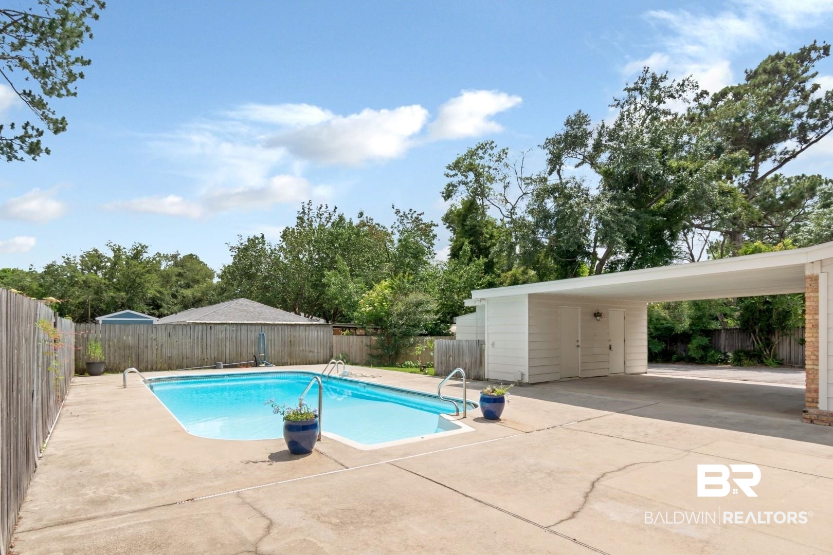 3755 Claridge Road North Mobile, AL 36608 - Photo 34 of 38 View of swimming pool featuring a fenced backyard and a patio