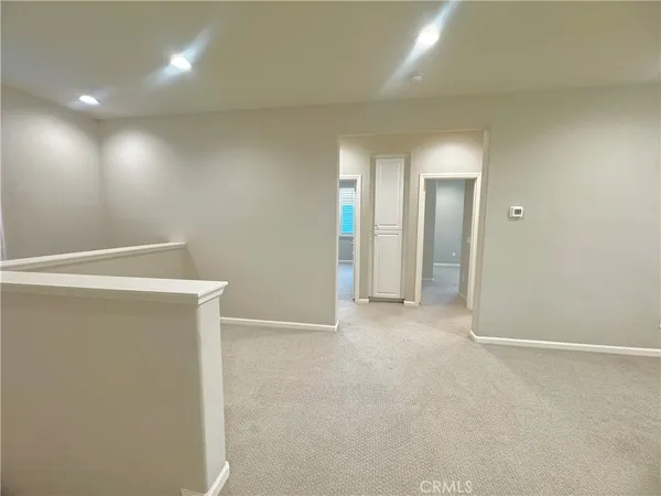 an empty room with an entryway