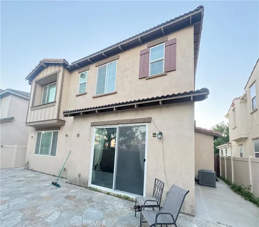 a view of a house with patio