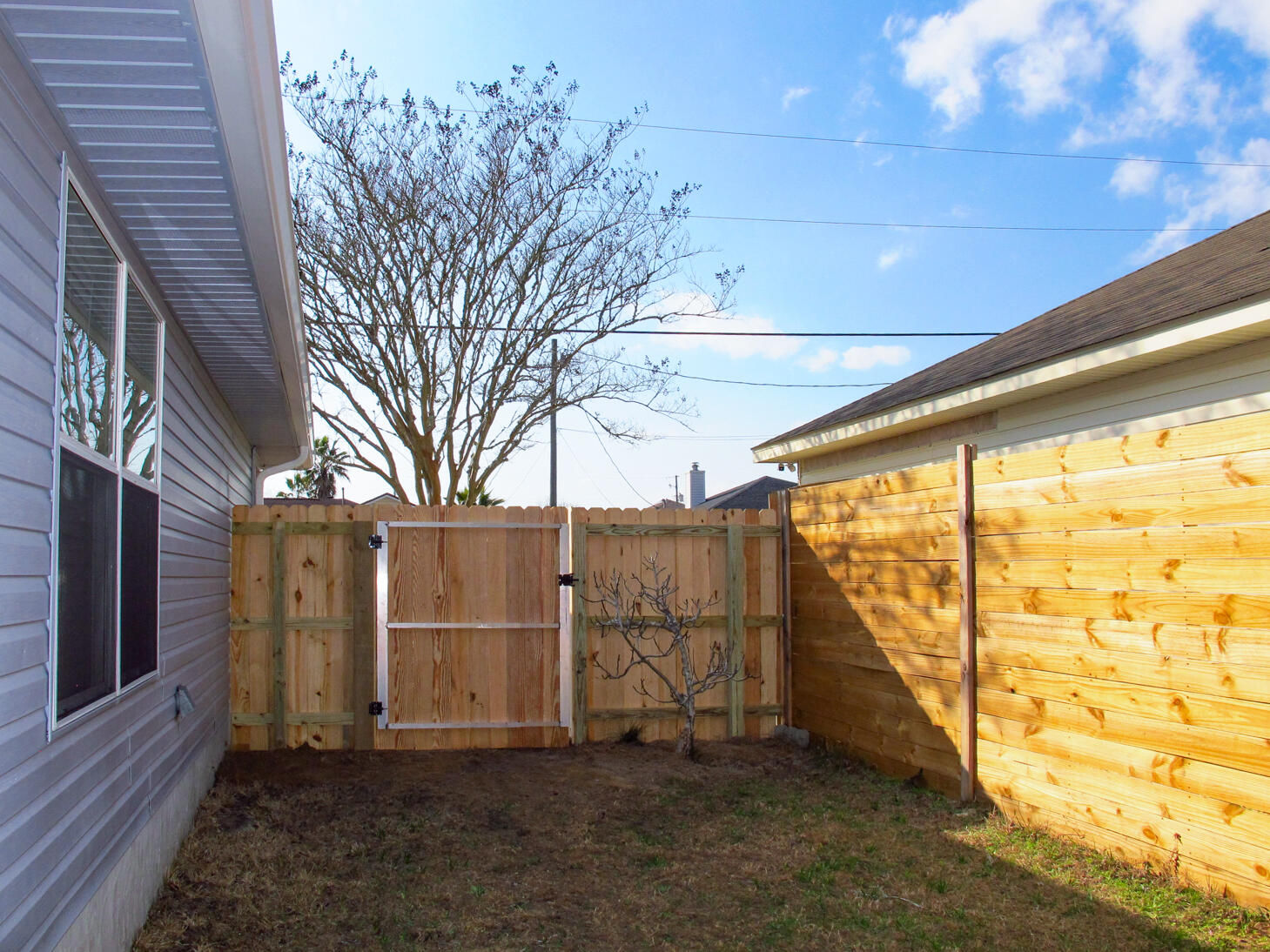 78 Stowe Road Mary Esther, FL 32569 - Photo 28 of 32 Back Gate 1-1