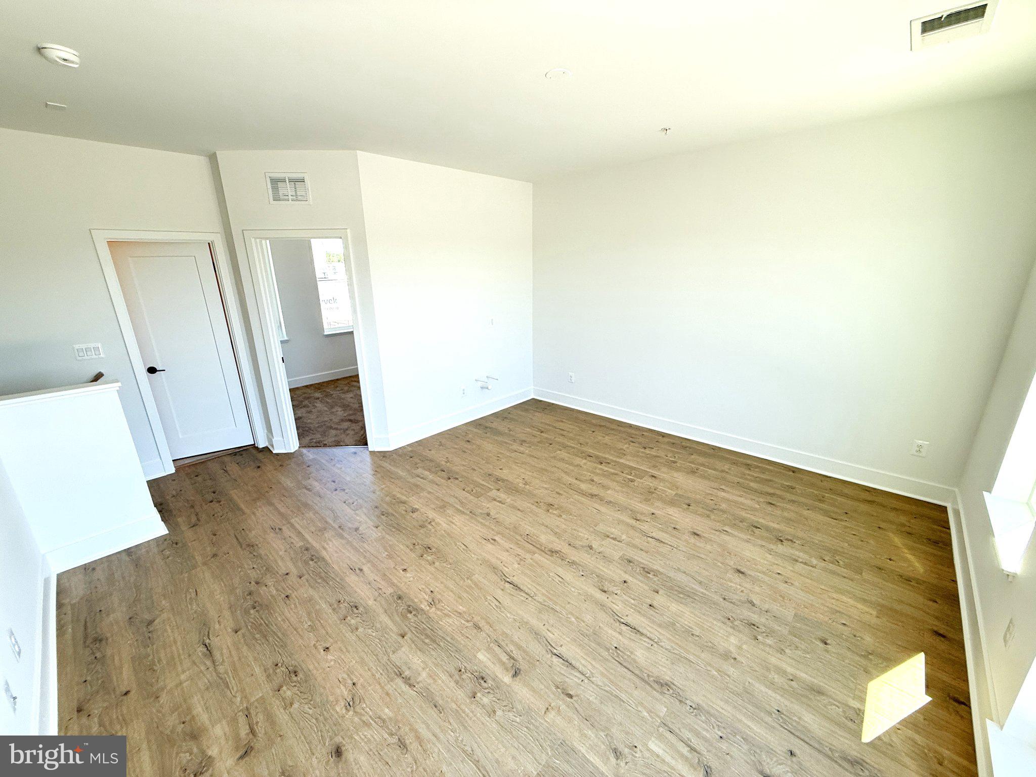 33 Lower Service Court Northwest Washington, DC 20001 - Photo 41 of 51 Spacious, sunlit living area awaits.