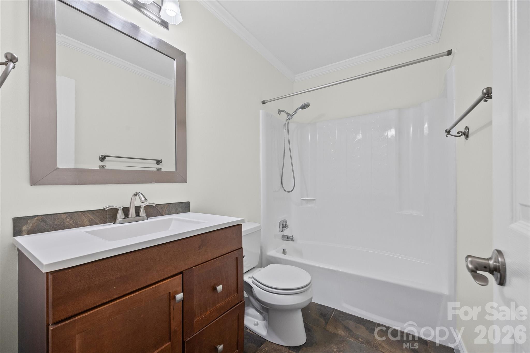 16149 Haroa Court Fort Mill, SC 29708 - Photo 14 of 40 a bathroom with a sink a toilet and shower
