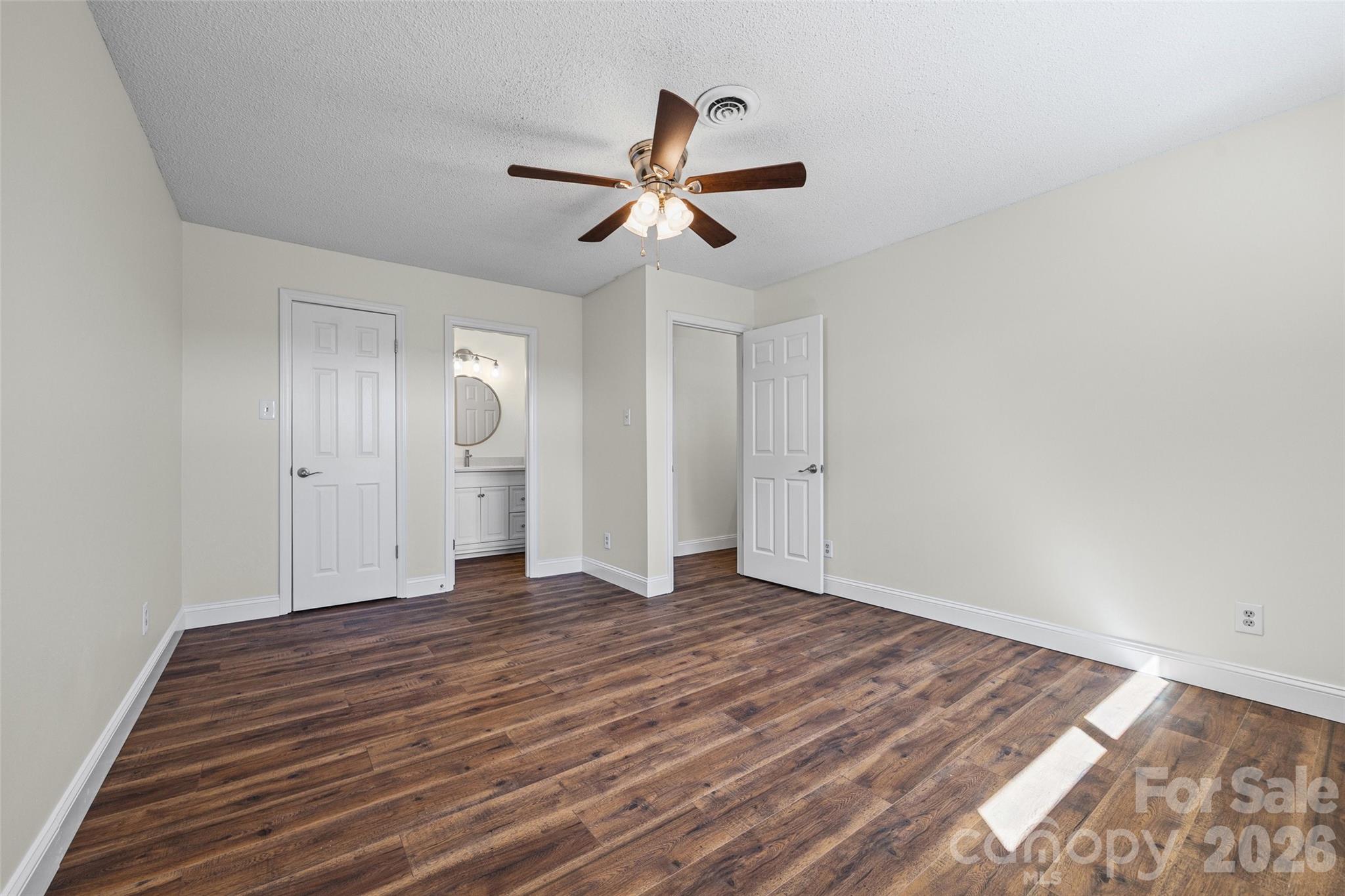 16149 Haroa Court Fort Mill, SC 29708 - Photo 19 of 40 a view of empty room with wooden floor