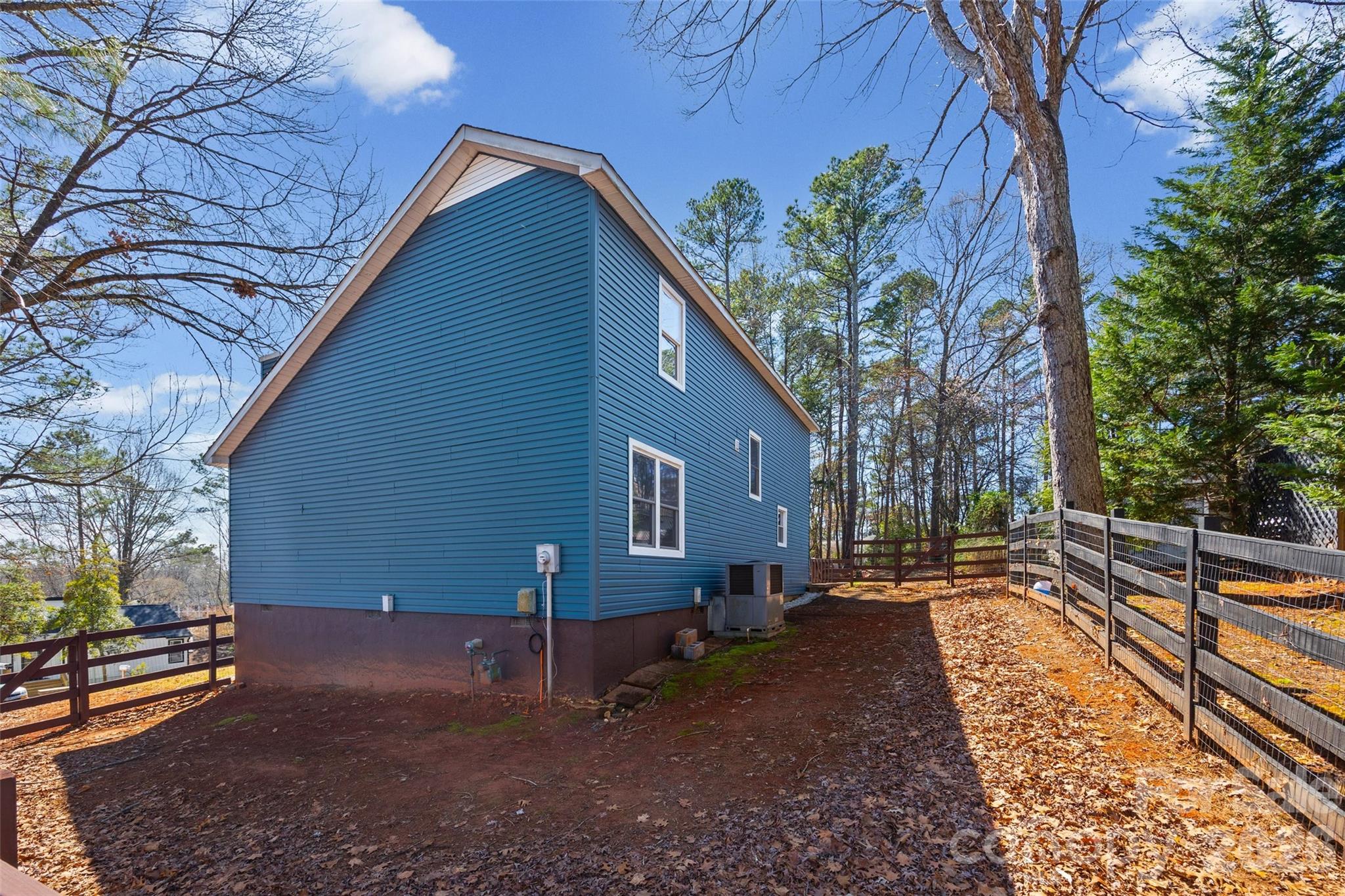 16149 Haroa Court Fort Mill, SC 29708 - Photo 25 of 40 a backyard of a house with table and chairs