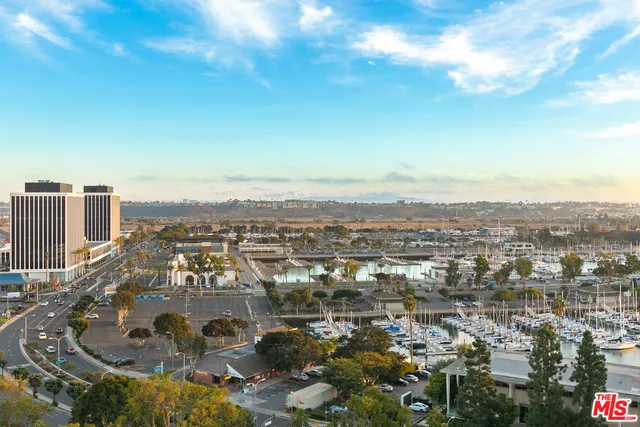 a view of a city with tall buildings