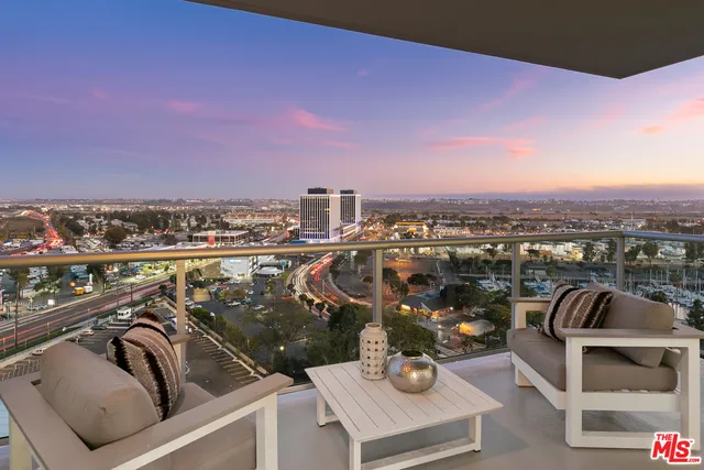 a view of a terrace with sitting area