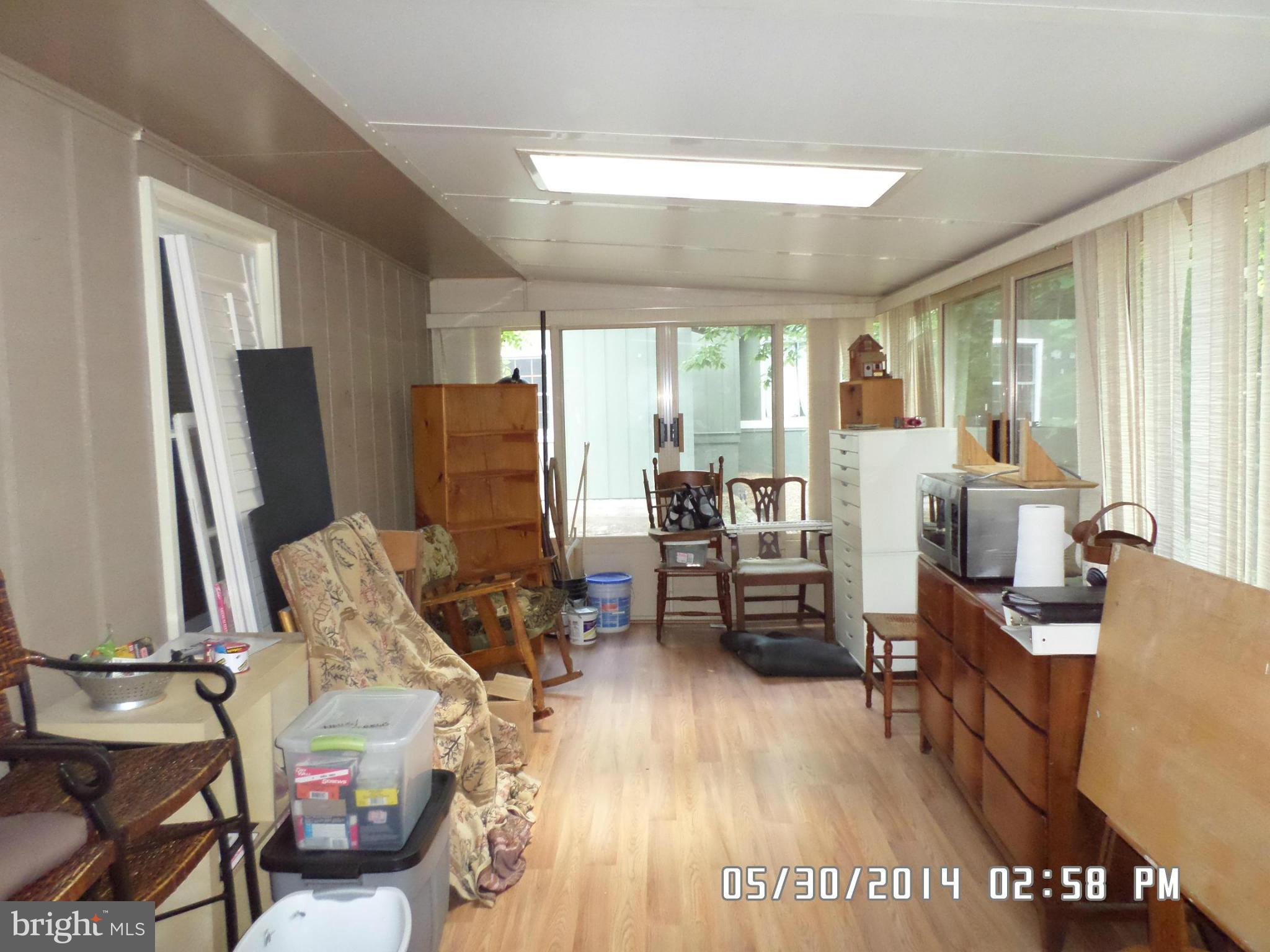 307 Happy Creek Road Locust Grove, VA 22508 - Photo 12 of 18 Great sunroom with it's own ac/heat unit