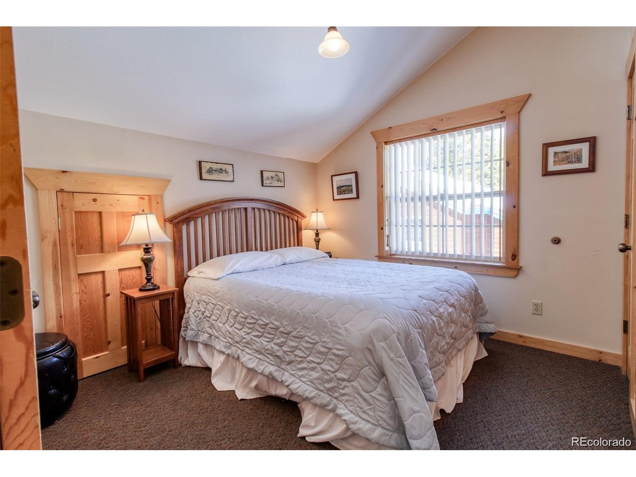 4 Lost Mine Loop, Unit 4B Leadville, CO 80461 - Photo 13 of 16 a bedroom with a bed and a window