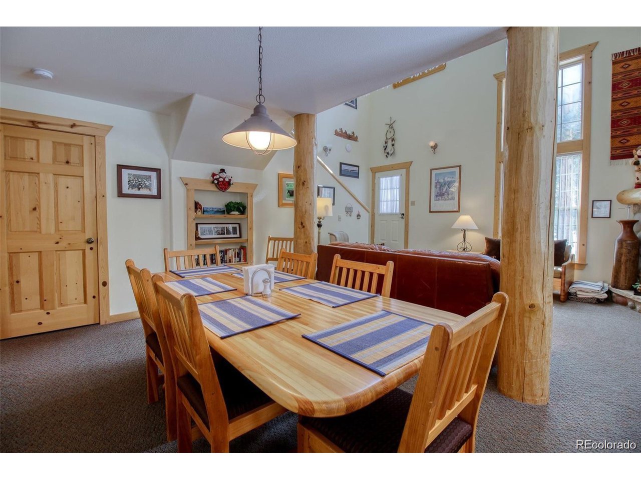 4 Lost Mine Loop, Unit 4B Leadville, CO 80461 - Photo 4 of 16 a view of a dining room with furniture and wooden floor