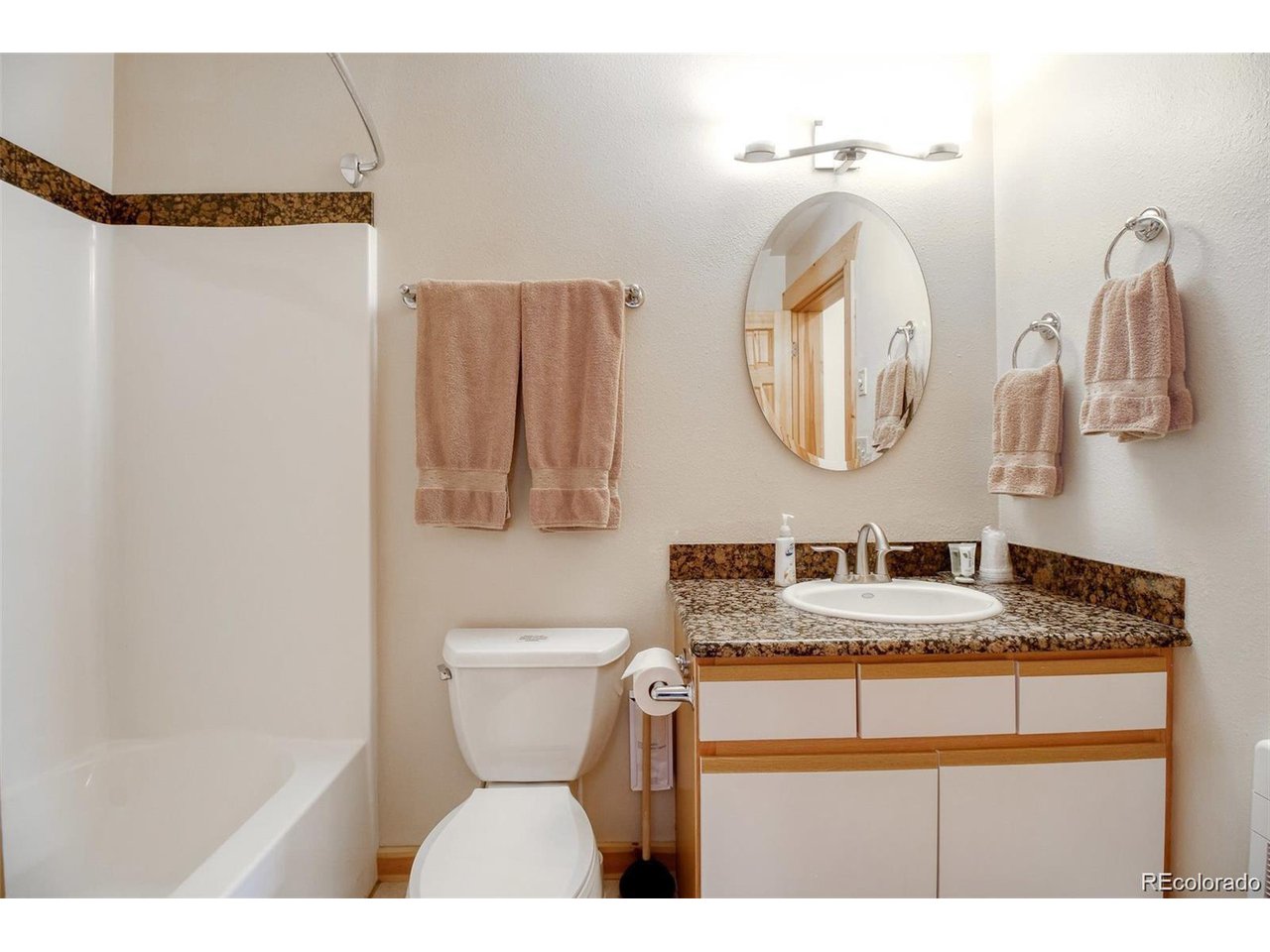 4 Lost Mine Loop, Unit 4B Leadville, CO 80461 - Photo 9 of 16 a bathroom with a sink and a mirror