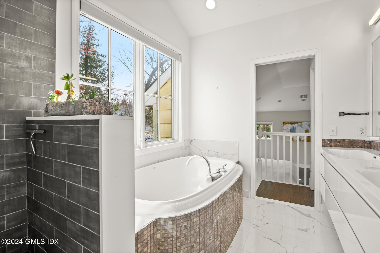 38 Amherst Road Riverside, CT 06878 - Photo 15 of 22 a bathroom with a tub sink and mirror