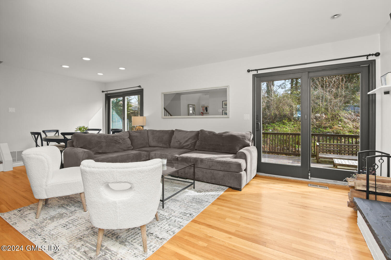 38 Amherst Road Riverside, CT 06878 - Photo 6 of 22 a living room with furniture and a large window