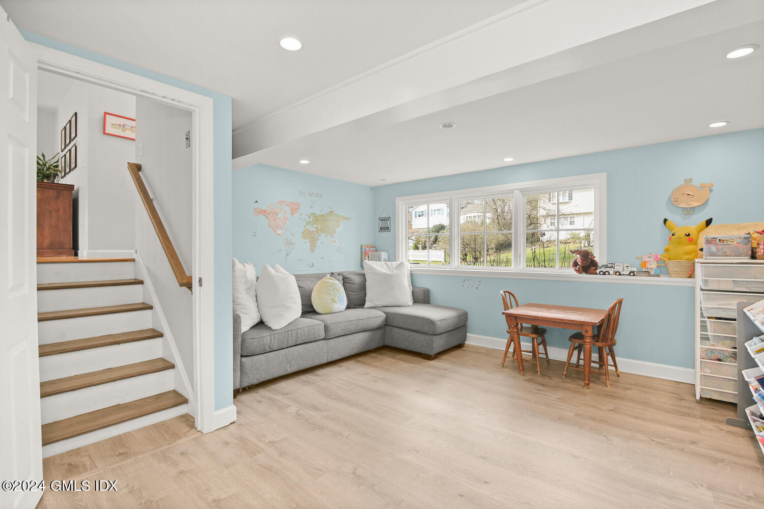 38 Amherst Road Riverside, CT 06878 - Photo 8 of 22 a living room with furniture and a large window