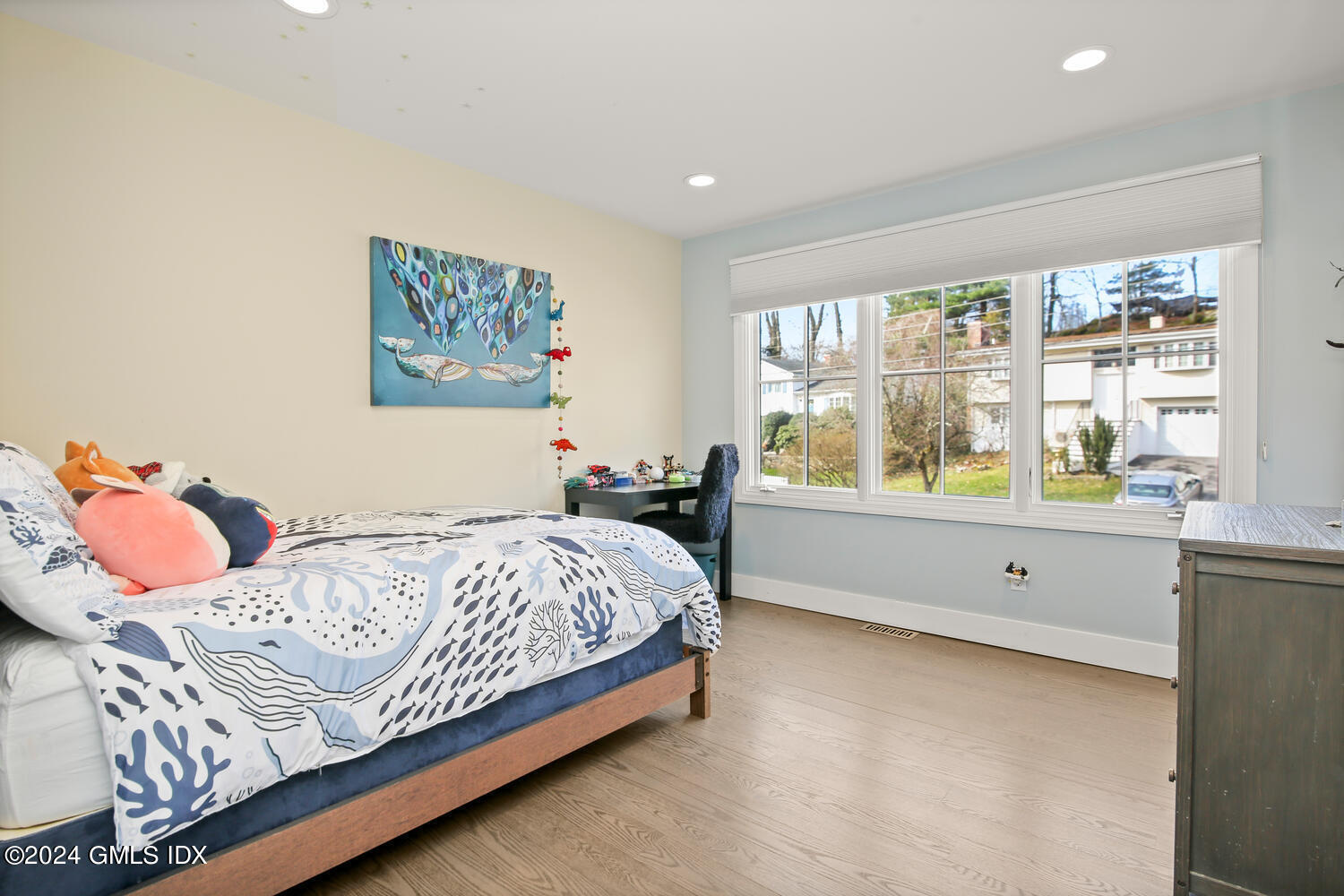 38 Amherst Road Riverside, CT 06878 - Photo 10 of 22 a bed sitting in a bedroom next to a window