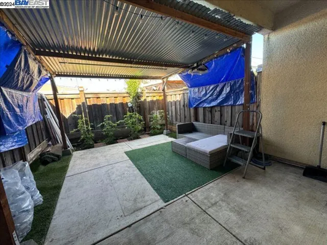 a house view with a backyard space
