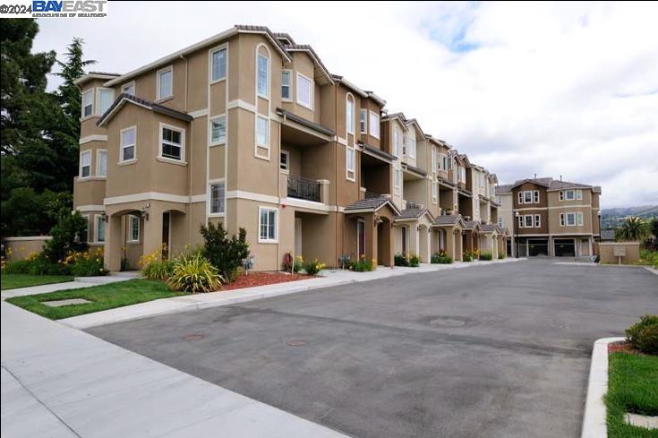 3101 Starburst Court San Jose, CA 95127 - Photo 3 of 15 a front view of residential houses with yard and green space